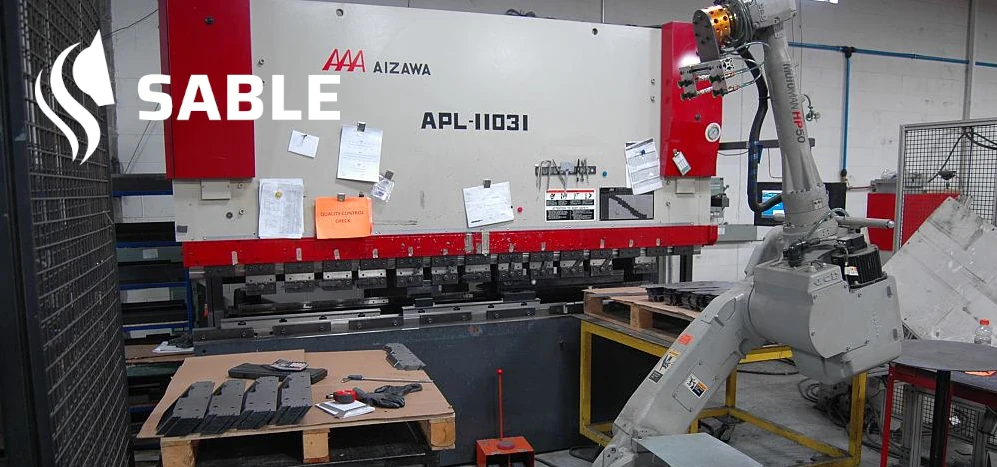 Flats from the semiautomatic laser cutting tables are positioned, the unmanned press brake cell can complete the bends.